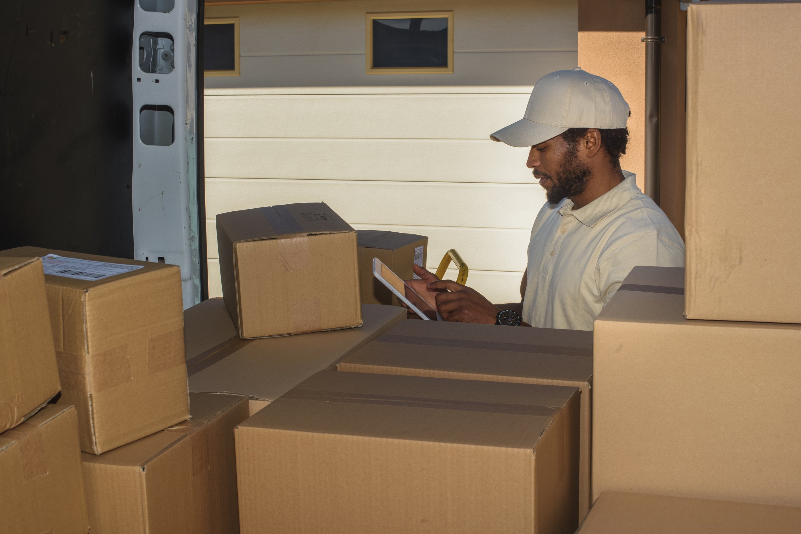 Courier Service Delivery Man Sorting Parcels